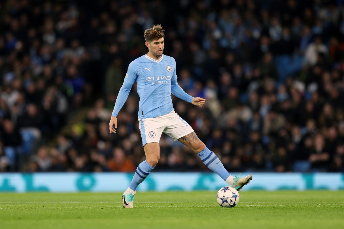 How will Manchester City cover the absence of John Stones?